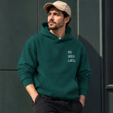 We Need A Hug Hoodie – Koyu Yeşil – model üzerinde ön görünüm