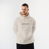 What The Fuck Is Tesla Hoodie – Krem – model üzerinde ön görünüm